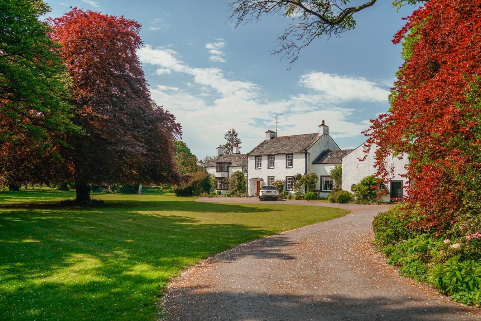 Isel Bridge House — the Georgian vicarage with sash windows and slate roof